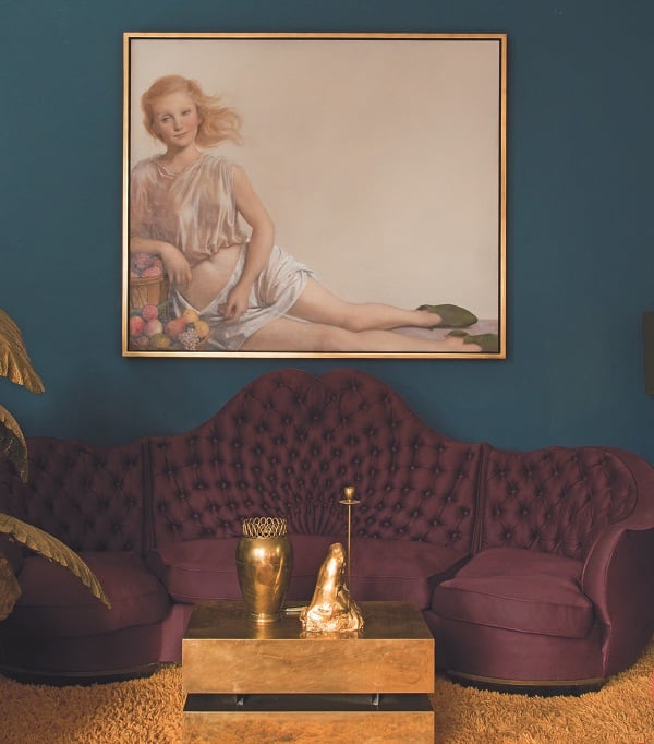Feinstein and Currin's living room, where a portrait by Currin hangs.