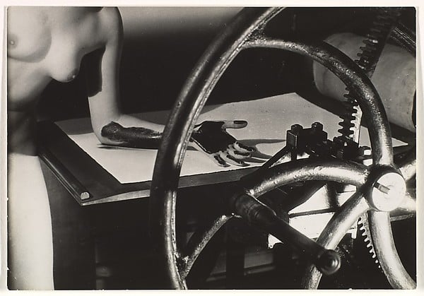 Man Ray, Meret Oppenheim at the Printing Wheel, 1933.Photo via Metropolitan Museum of Art, New York.