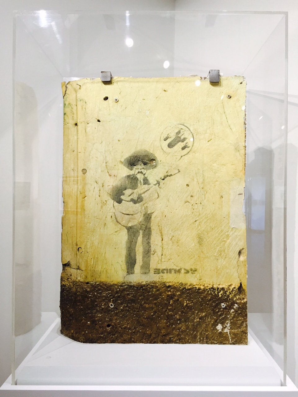 Banksy, <em>Mariachi Player</em> (2001).  Photo: Taglialatella Galleries, New York.