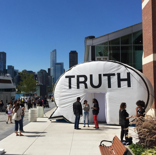 Hank Willis Thomas and The Cause Collective's <em>Truth Booth</em> in front of Expo Chicago