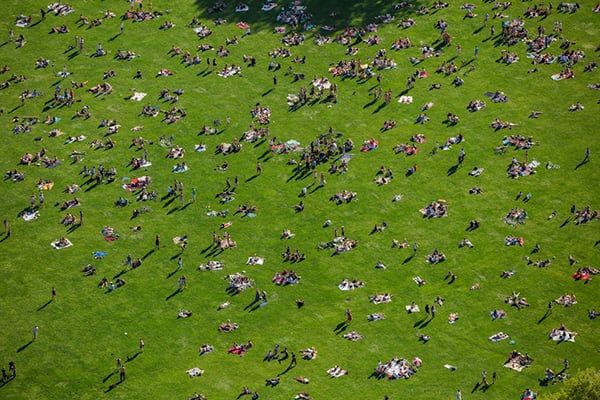 George Steinmetz, "New York Air." Sunbathers enjoy the first warm afternoon of spring on the Sheep Meadow in Central Park. Photo: George Steinmetz, courtesy Anastasia Photo.