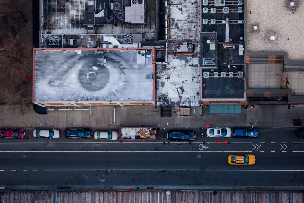 George Steinmetz, "New York Air." A photographic installation by the artist JR adorns the roof of a building used to tape The Colbert Report on West 54th Street. Photo: George Steinmetz, courtesy Anastasia Photo.