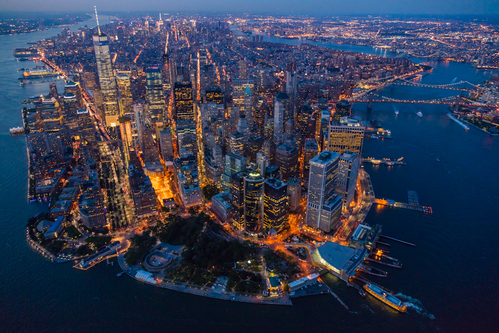 George Steinmetz, "New York Air." At twilight, Manhattan resembles a vast living organism with ribbons of energy pulsing through its streets and up into its hundred thousand buildings. Photo: George Steinmetz, courtesy Anastasia Photo.