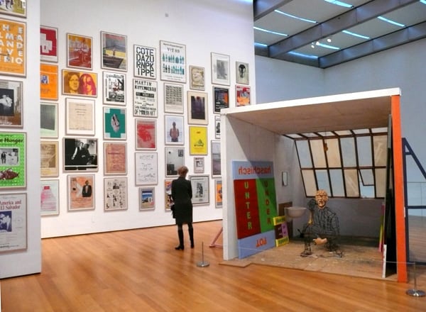 Martin Kippenberger posters in "Martin Kippenberger: The Problem Perspective" at the Museum of Modern Art<br>Photo: Courtesy Walter Robinson