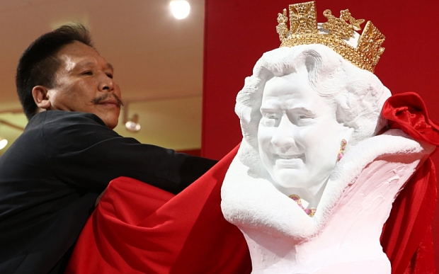 Chen Dapeng with the bust. Photo: James Shaw/REX Shutterstock (5334713d) 