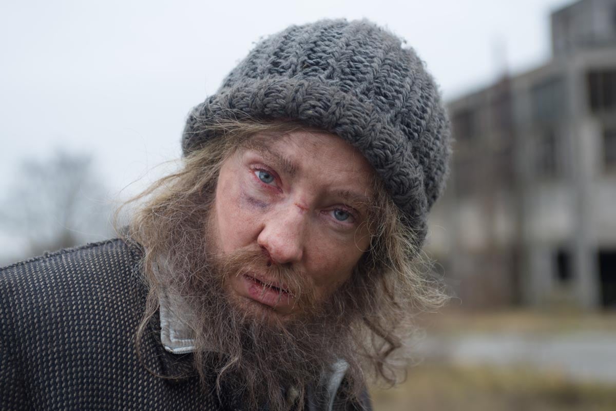 Julian Rosefeldt, <em>Manifesto</em> (2015), film still featuring Cate Blanchett as a homeless man. Courtesy Julian Rosefeldt and VG Bild-Kunst, Bonn. 