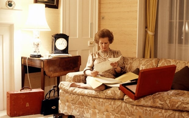Prime Minister Thatcher pictured with her red dispatch box, included in the sale. Photo: Herbie Knott/REX Shutterstock