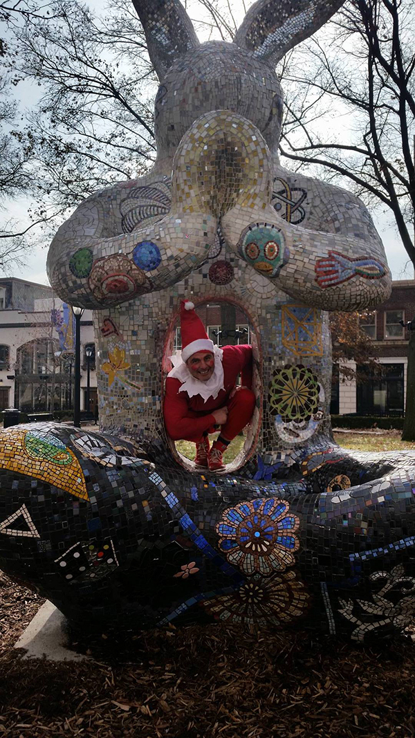 Pat Waterkotte as the Creepy Elf with Catherine Magel's Rabbit Earth in Strauss Park, St. Louis. Photo: Dawn Boly.