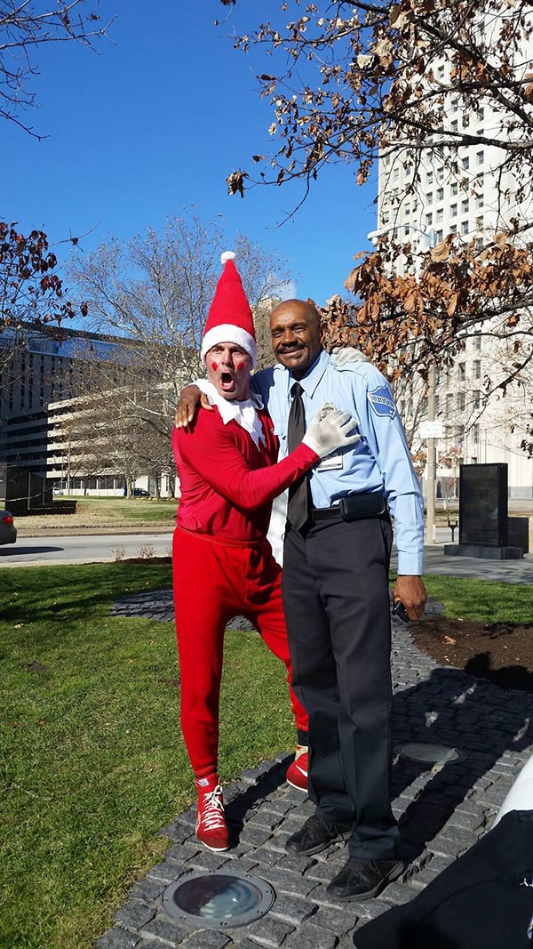 Pat Waterkotte as the Creepy Elf with a security guard. Photo: Dawn Boly.