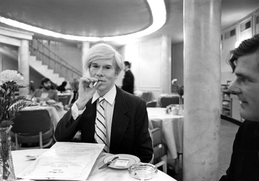 Robert Levin, Andy Warhol seated at a table at the Pierre Hotel in New York City (1981). Photo: courtesy Maison Gerard.