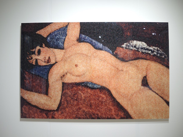 Soraya Doolbaz's version of Amedeo Modigliani's <em>Nu Couché (Reclining Nude)</em>, a mosaic of photos of penises in costume as political figures. Photo: Sarah Cascone. 