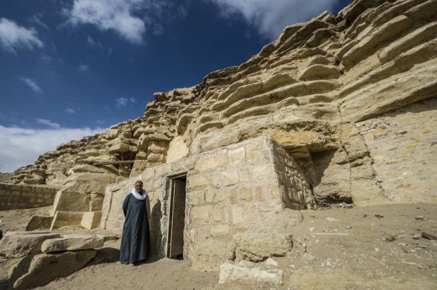 A man at the entrance to the tomb of King Tut's wet nurse. Photo: Khaled Desouki, courtesy AFP/Getty Images.