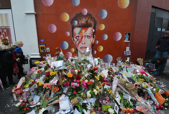 A mural in South London has become a shrine to the late David Bowie. Photo: Jim Dyson, courtesy Getty Images.