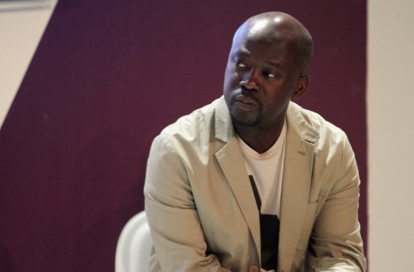 MIAMI BEACH, FL - DECEMBER 01: David Adjaye speaks at Design Miami 2011 Design Talk hosted by W Magazine & moderated by Stefano Tonchi at the Miami Beach Convention Center on December 1, 2011 in Miami Beach, Florida. (Photo by Alexander Tamargo/Getty Images for Design Miami)