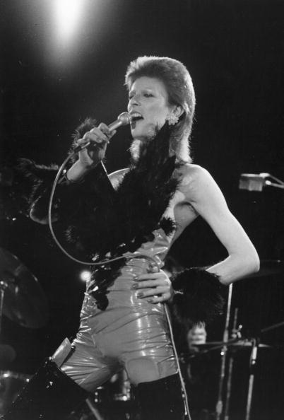 David Bowie performing in his 'Angel of Death' costume at a live recording for a Midnight Special TV show made at The Marquee Club in London to a specially invited audience of Bowie fanclub members, 20th October 1973. (\ Photo: Jack Kay/Express/Getty Images.
