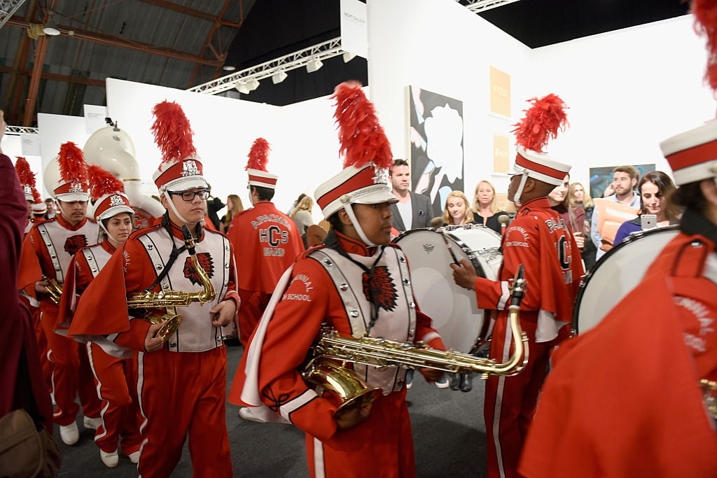 SANTA MONICA, CA - JANUARY 28: Marching band performs during the Art Los Angeles Contemporary 2016 Opening Night at Barker Hangar on January 28, 2016 in Santa Monica, California. Photo by Angela Weiss/Getty Images for Art Los Angeles Contemporary.