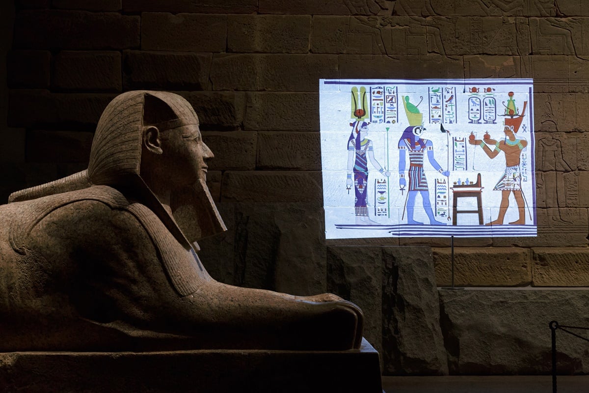 Experimental lighting display <em>Color the Temple</em> at The Temple of Dendur in The Sackler Wing at The Metropolitan Museum of Art, New York. <br>Photo: Courtesy of the Metropolitan Museum of Art/Gustavo Camps