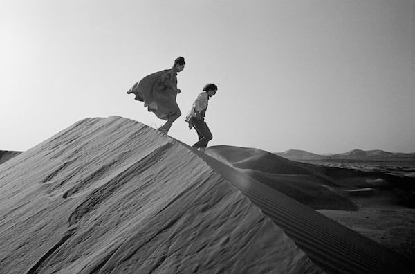 The Mastaba - Christo and Jeanne-Claude looking for a possible site for The Mastaba (1982) <br> Photo: Courtesy Galerie Gmurzynska