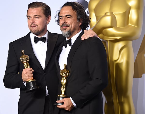 Actor Leonardo DiCaprio and director Alejandro González Iñárritu pose with their Best Actor and Best Director Oscars for The Revenant in the press room during the 88th Annual Academy Awards at Loews Hollywood Hotel on February 28, 2016 in Hollywood, California.Photo: Jason Merritt/Getty Images.