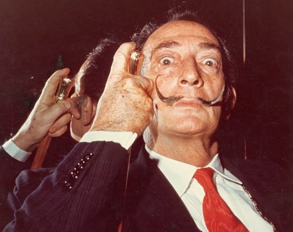 Portrait of Spanish artist Salvador Dali (1904 - 1989) with his cane, 1960s. Photo: Hulton Archive/Getty Images.