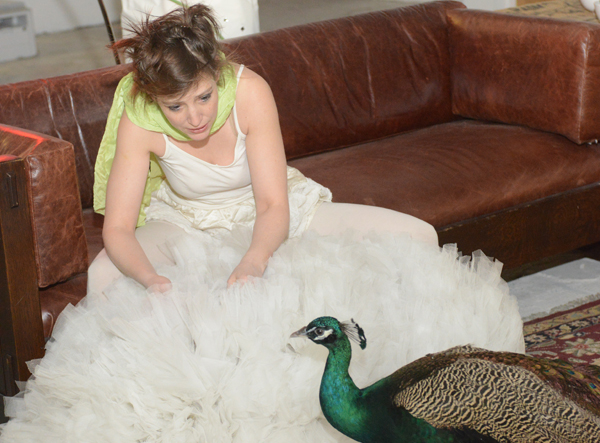 Kate Brehm and Dexter, the peacock at the 4Heads Benefit and Art Auction. <br>Photo: Mike Krasowitz, courtesy of 4heads, Inc.