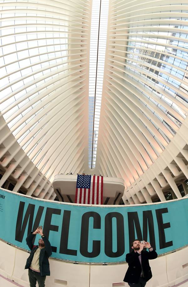 The first portion of Santiago Calatrava's World Trade Center Transportation Hub, known as the Oculus, opens to the public March 3, 2016. The WTC Transportation Hub's concourse will conveniently connect visitors to 11 different subway lines, the Port Authority Trans-Hudson (PATH) rail system, Battery Park City Ferry Terminal, the World Trade Center Memorial Site, WTC Towers 1, 2, 3, and 4, the World Financial Center and the Winter Garden. / AFP / Timothy A. CLARY (Photo credit should read TIMOTHY A. CLARY/AFP/Getty Images)
