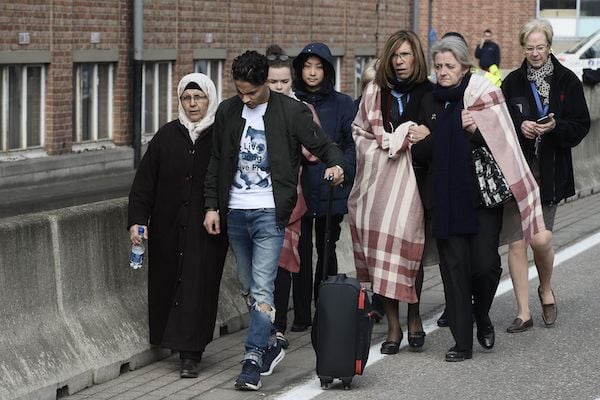 People are evacuated from Brussels Airport this morning <br> Photo: Dirk Waem / Stringer/ Getty 