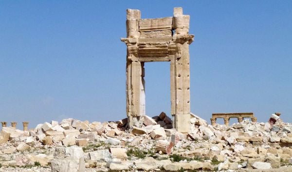 The remains of the entrance of the Temple of Bel in Palmyra, Syria. Photo: Maher Al Mounes/ Stringer/ Getty.