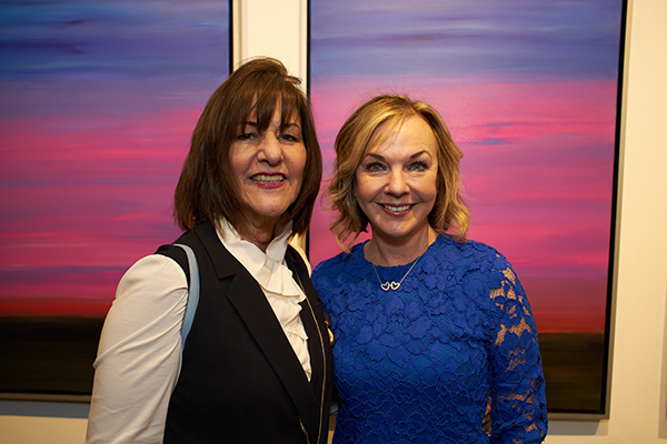 Kay Unger and Gay Gaddis at the opening of "Sky Descending: Texas Landscapes" at the Curator Gallery. <br>Photo: courtesy the Curator Gallery. 