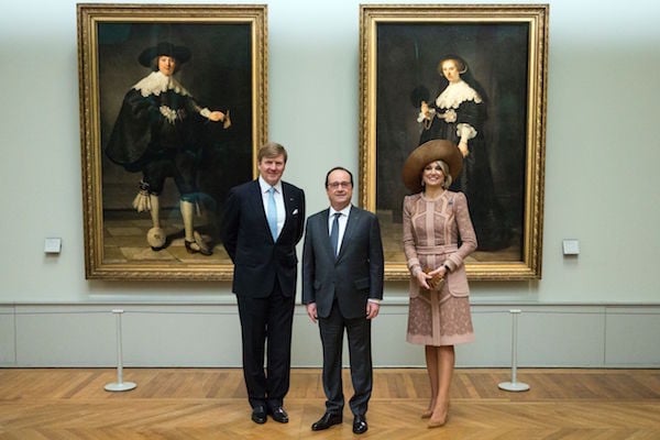 French President Francois Hollande (center) poses with King Willem-Alexander (L) and Queen Maxima of the Netherlands during their visit to the Louvre Museum to celebrate the acquisition by the Museum of two Rembrandt paintings in a conjoint operation with the Rijksmuseum.Photo: Etienne Laurent/POOL/AFP/Getty Images.