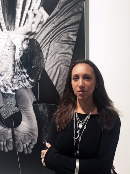 Shamim M. Momin, curator of “Wasteland,” in front of a work by Fay Ray at Galerie Thaddaeus Ropac, Pantin.<br>Photo: Courtesy LAND. 