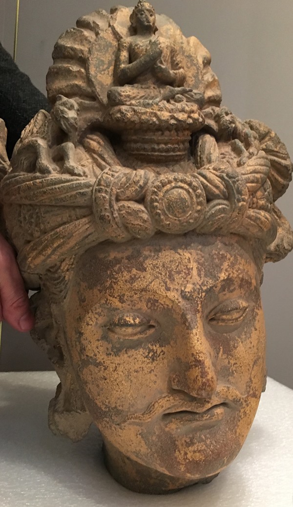 A second-century Boddhisattva head seized by authorities.<br>Photo: US Immigration and Customs Enforcement.