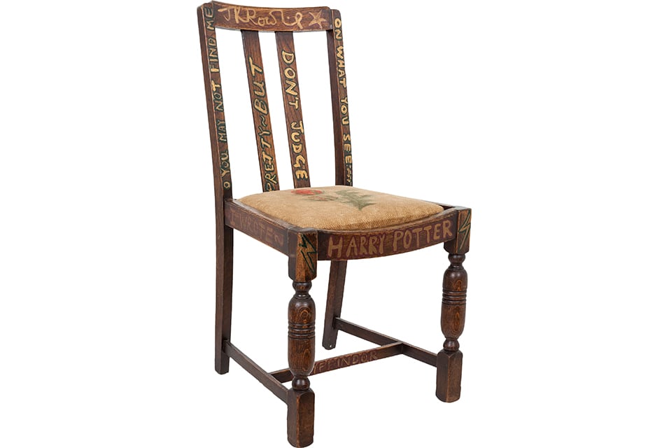 The chair where J.K. Rowling wrote Harry Potter, signed and painted by the author. Photo: courtesy Heritage Auctions.