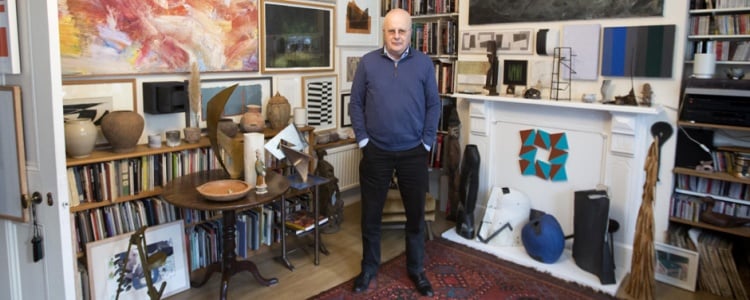 Tim Sayer with part of his art collection. <br>Photo: Rosie Hallam, courtesy the Hepworth Wakefield.