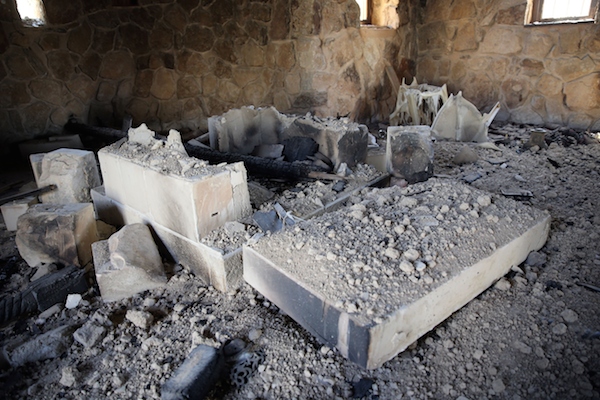 The altar burnt and destroyed by ISIS <br> Photo: JOSEPH EID/AFP/Getty Images
