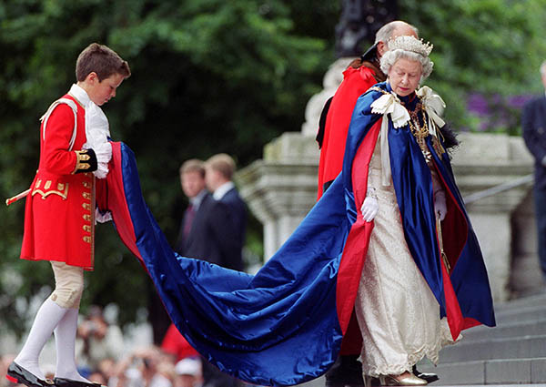Queen Elizabeth II is greeted as she arrives for the Order of St. Michael and St. George ceremonial service at St. Paul's Cathedral in London, on July 14th 2000. Photo: Mark Stewart.