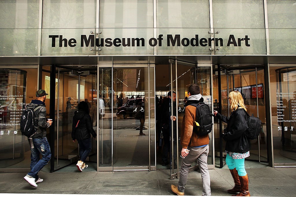 People walk into the Museum of Modern Art (MoMA). Courtesy of Spencer Platt/Getty Images.