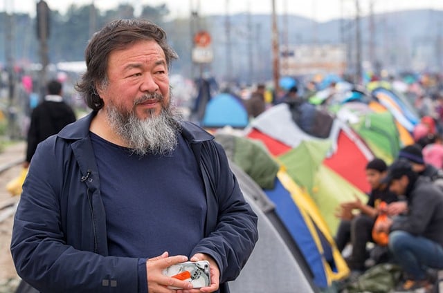 Ai Weiwei visits the Idomeni refugee camp, on the border of Greece and Macedonia, on March 11, 2016. Photo: Matt Cardy/Getty Images.