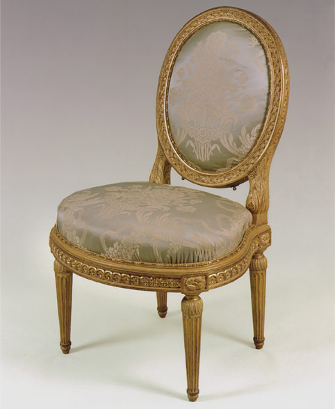 A chair made by Louis Delanois for Louis XV's mistress Madame du Barry. Courtesy of Versailles. 