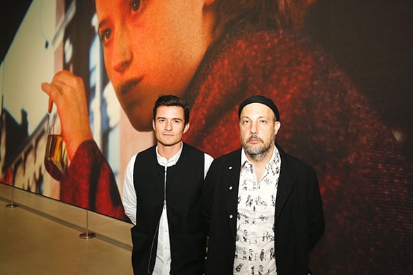 Orlando Bloom and Stefan Simchowitz pose during the "Cindy Sherman: Imitation of Life" exhibition opening at the Broad museum in Los Angeles, California. Courtesy photographer Ryan Miller/Capture Imaging.