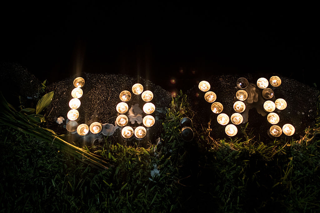 ORLANDO, FL - JUNE 12: Candles sit on the edge of Lake Eola, June 12, 2016 in Orlando, Florida. The shooting at Pulse Nightclub, which killed 50 people and injured 53, is the worst mass-shooting event in American history. (Photo by Drew Angerer/Getty Images)