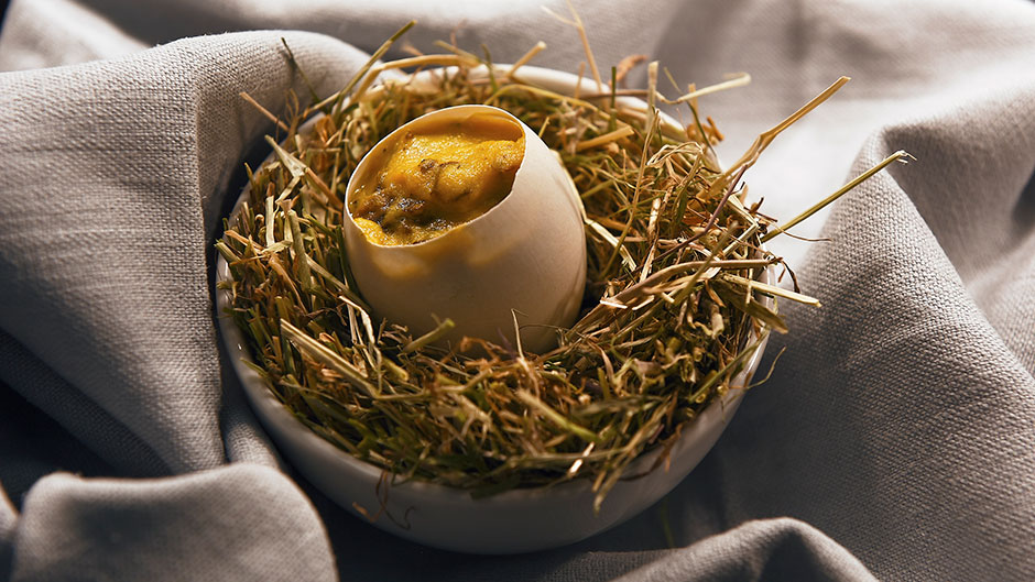 Coddled duck egg with smoked butter and mushrooms prepared by Ollie Dabbous for Sotheby's London ahead of their February contemporary sale. Courtesy of Sotheby's London.