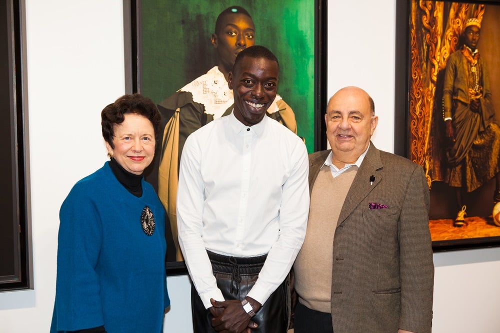 Ron and Ann Pizzuti, with artist Omar Victor Diop. Courtesy of the Pizzuti Collection.