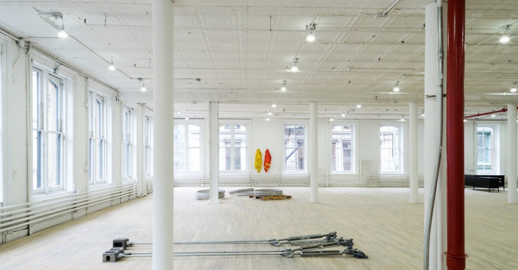 Artists Space's previous location at 38 Greene Street, featuring Cameron Rowland's 2016 exhibition, <em>91020000</em>. Courtesy of Artists Space.