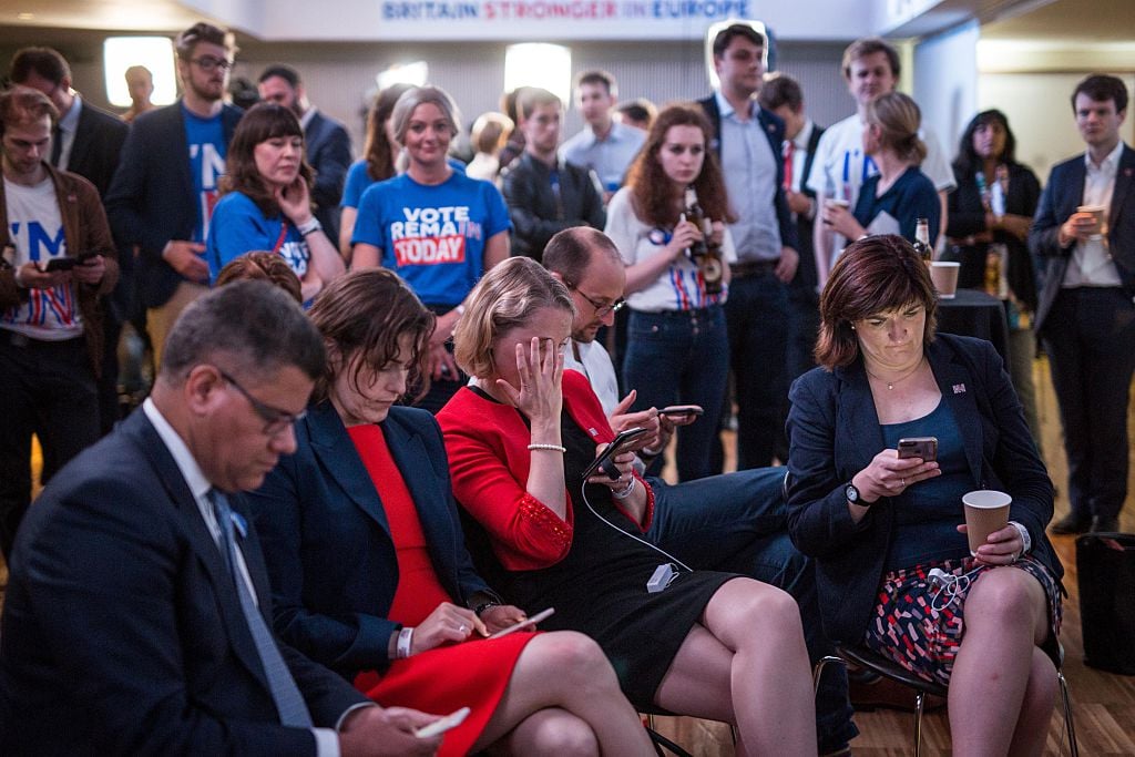 Supporters of the 'Stronger In' Campaign react as results of the EU referendum are announced at a results party at the Royal Festival Hall in London early in the morning of June 24, 2016. Bookmakers dramatically reversed the odds on Britain leaving the European Union on Friday as early results from a historic referendum pointed to strong support for a Brexit. / AFP / POOL / ROB STOTHARD (Photo credit should read ROB STOTHARD/AFP/Getty Images)