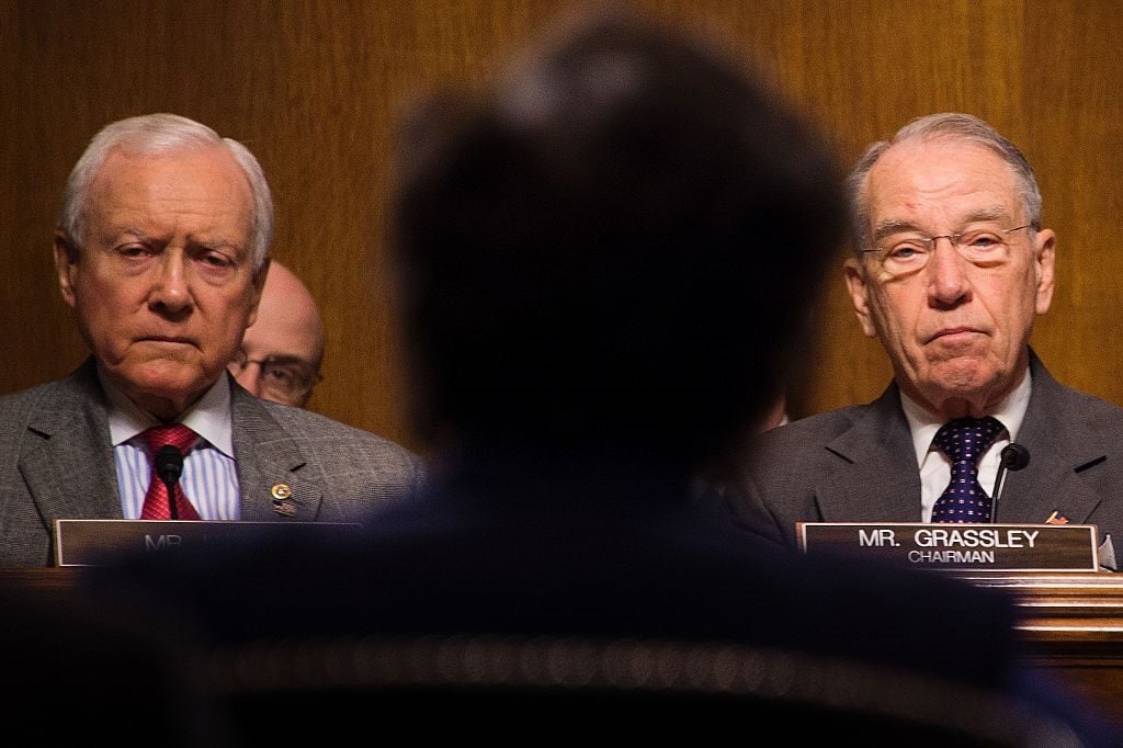 Senate Judiciary Committee Chairman Chuck Grassley, right, a Republican of Iowa, and US Senator Orrin Hatch, left, a Republican of Utah, at testimony at the Senate Judiciary Committee on Capitol Hill in Washington, DC, March 9, 2016. Photo Jim Watson /AFP/Getty Images.