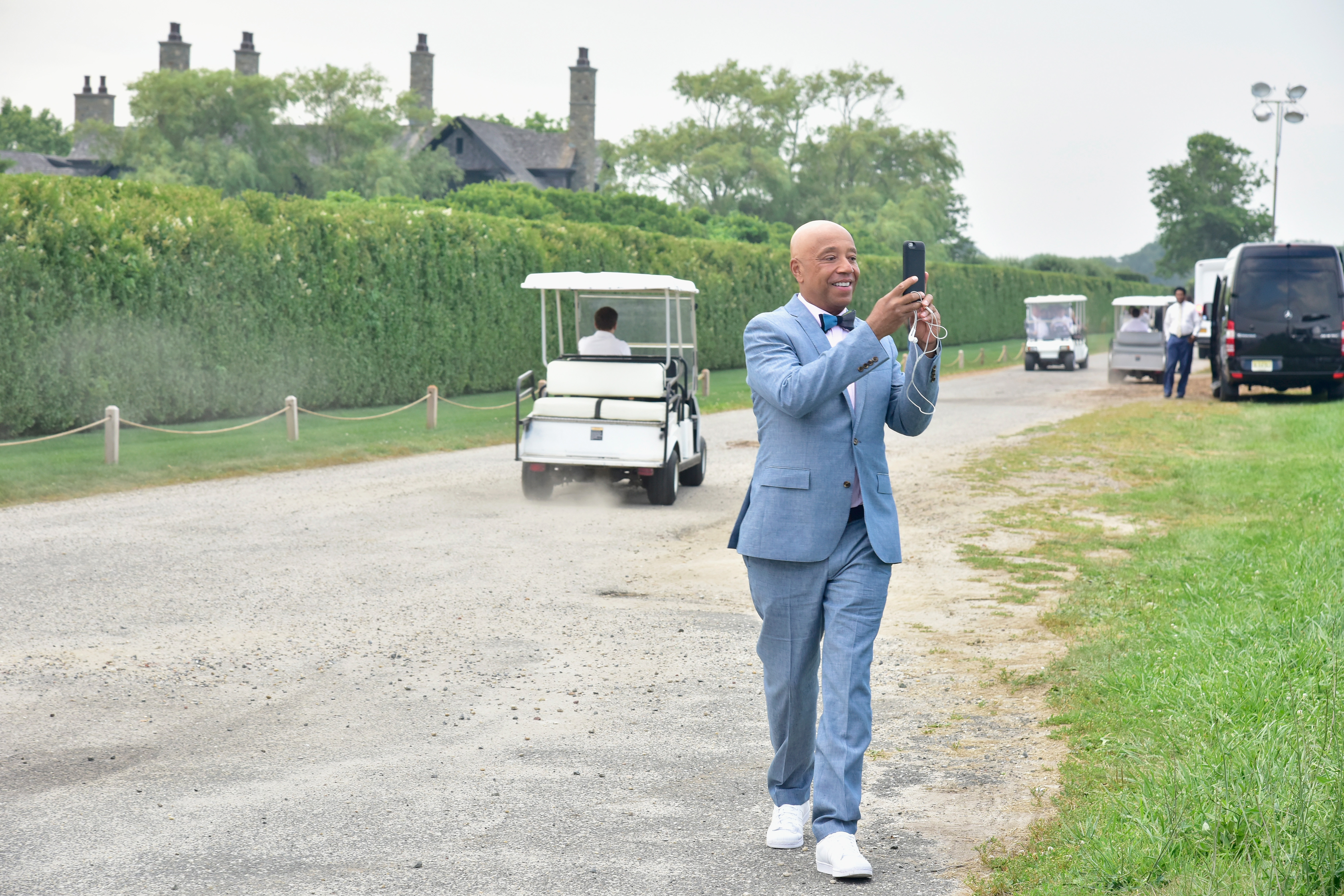 Russell Simmons attends Rush Philanthropic Arts Foundation's 2016 ART FOR LIFE Benefit presented by Bombay Sapphire Gin at Fairview Farms. Courtesy Eugene Gologursky/Getty Images for Bombay Sapphire.