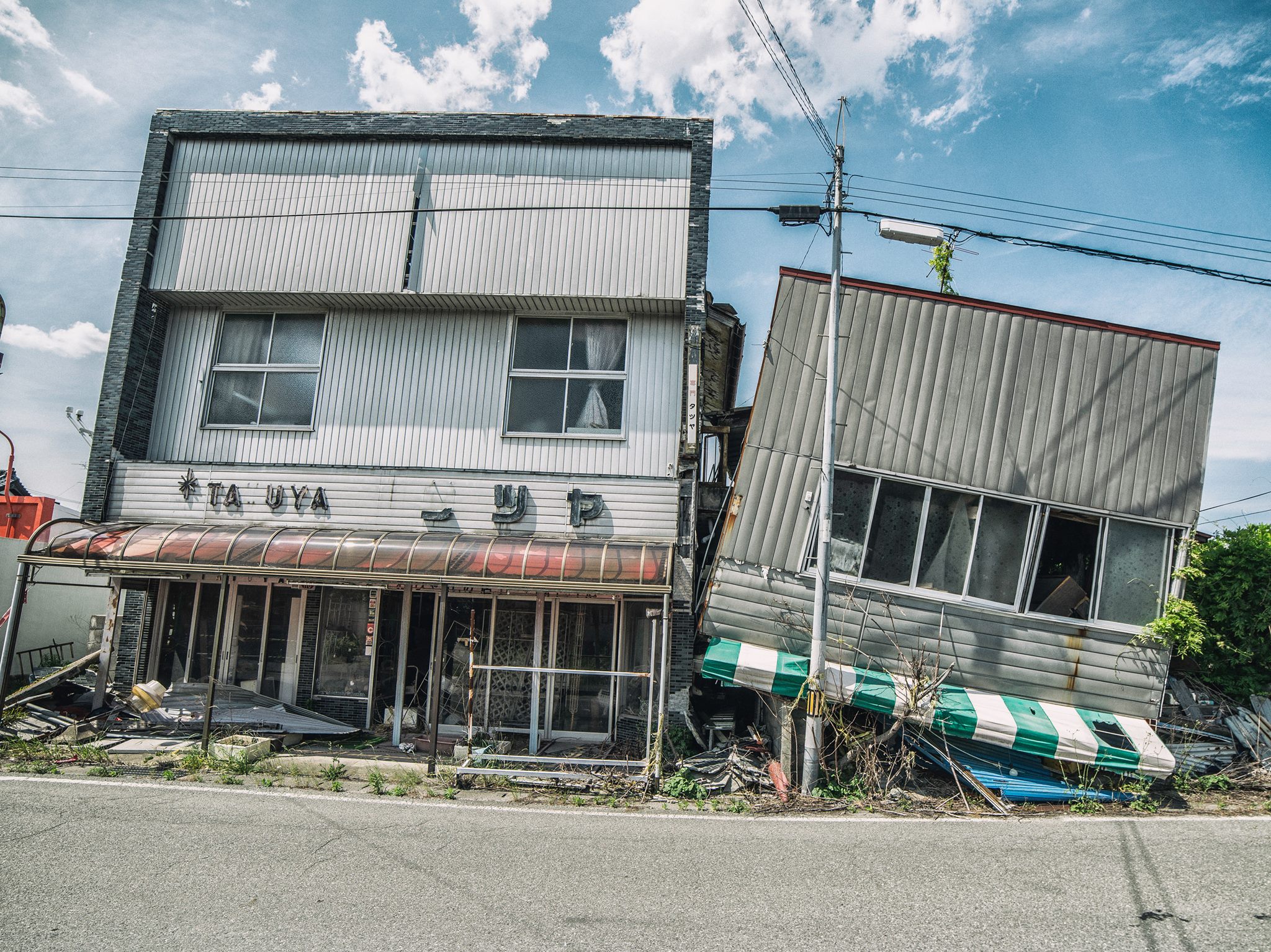 Collapsed buildings in Fukushima. Courtesy of Keow Wee Loong.