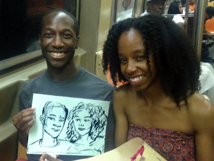 A couple with their portrait by Orin. Courtesy of Sarah Cascone. 