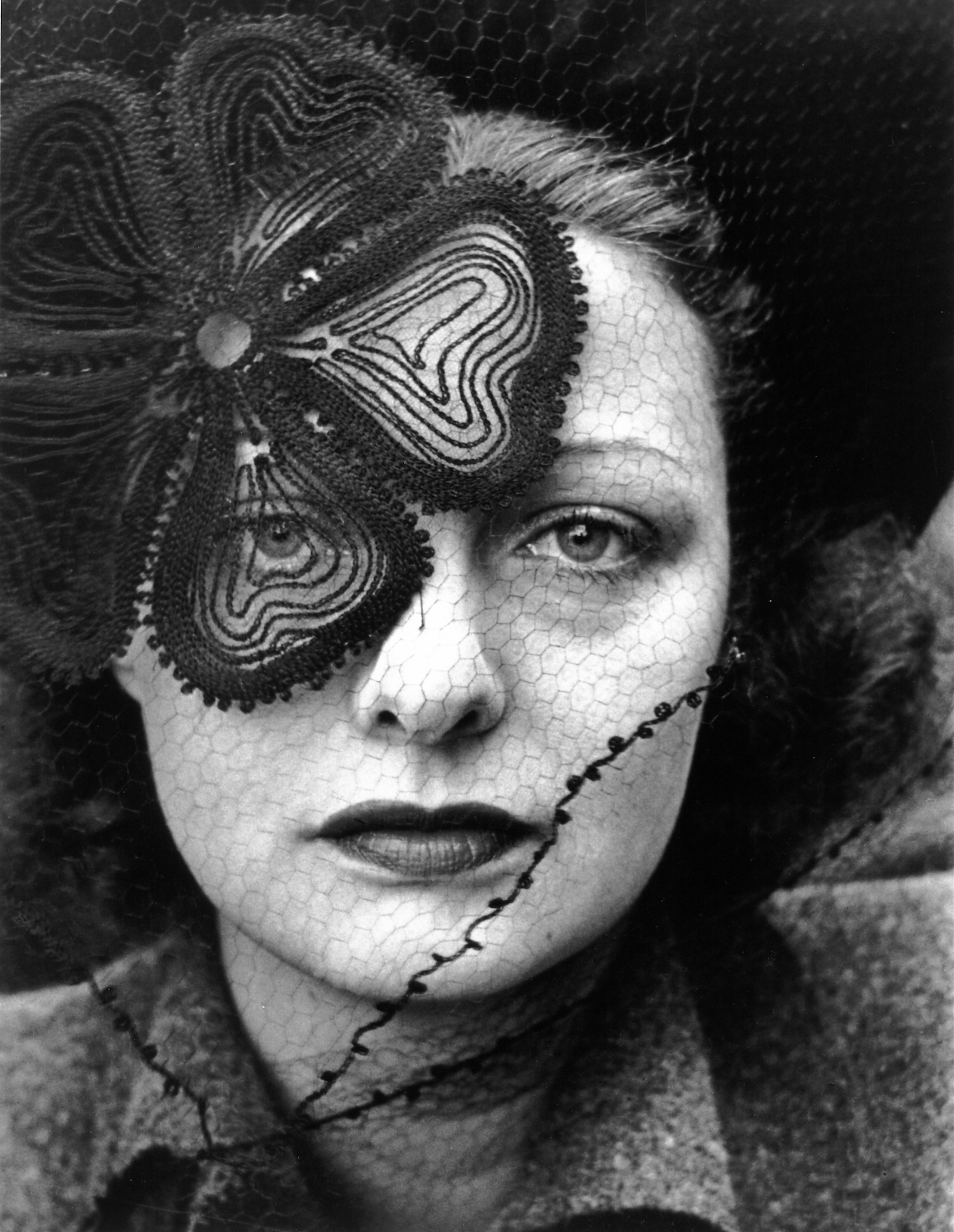 Alfred Eisenstaedt, <em>Professional model Janet MacLeod wearing veiled hat designed by Lilly Dache</em> (1937). Courtesy of Spring Studios, © Time Inc.